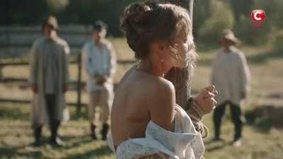 It is tradition for the condemned women to be whipped before they are stripped and raised on the cross in front of the whole town.