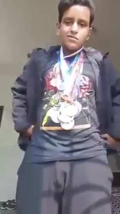 Guy flexing his medals (repost because it was removed)