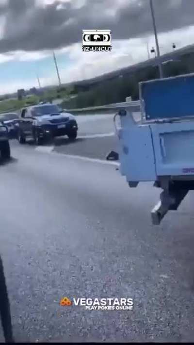 Two Kind-Hearted Good Samaritans Stop To Help A Gentleman Who Has Unfortunately Got A Flat Tire On The Way To His Krav Maga Class, They Assist Him Promptly And Get Him Back On The Road Fast