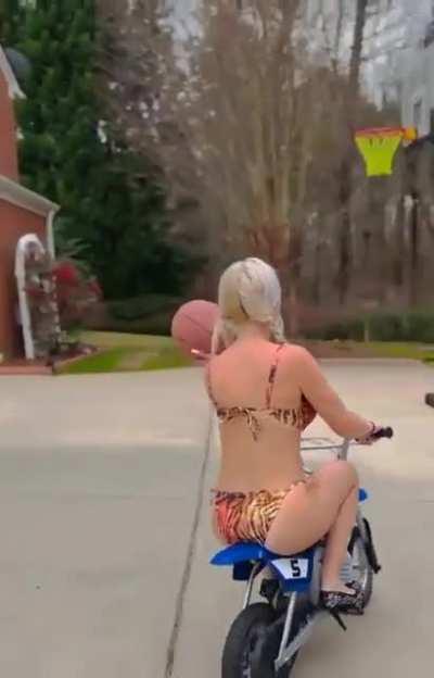 WCGW playing basketball on a minibike