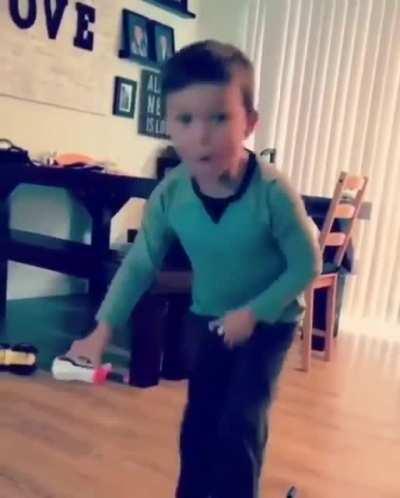 Kid tries nerf gun on the wrong place