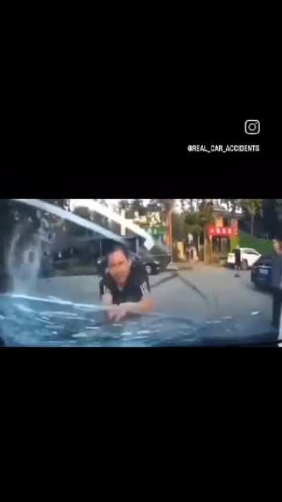 Dude learns a lesson after smacking car several times