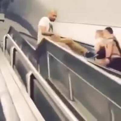 Rapper and podcast host Joe Budden falls down escalator.