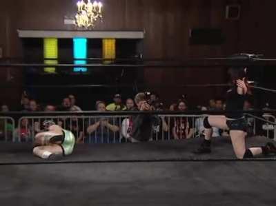 Kellie Skater suffering Saraya's running dropkick