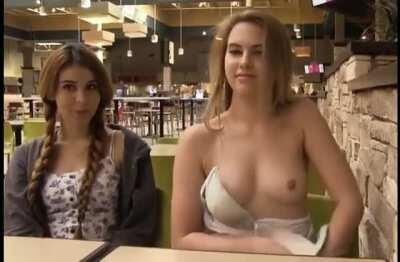 Takes off her bra in a restaurant (x-post /r/nsfw_gifs)