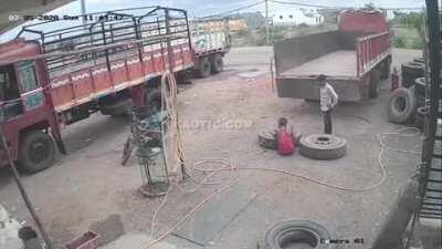 Sitting too close to an inflating semi truck tire.