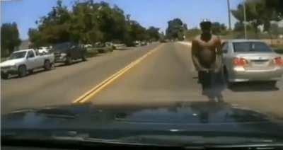 Road rage, before he realizes its an undercover cop.