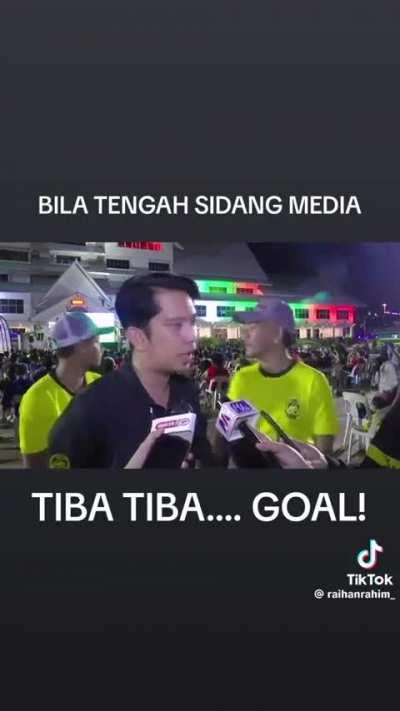 Adam Adli abandoning the interview to celebrate Malaysia’s goal