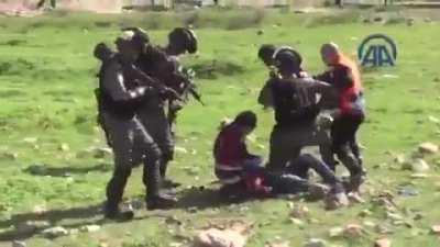 Israeli soldiers attacking Palestinian paramedics as they rescue the injured to save their lives!!!