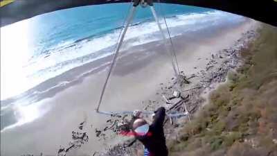 The harness fails to hold the hang glider