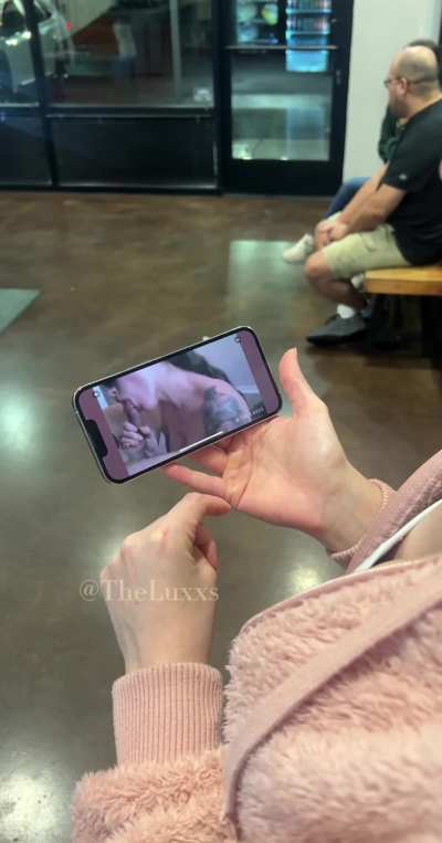 Watching the movie we just made while picking up dinner