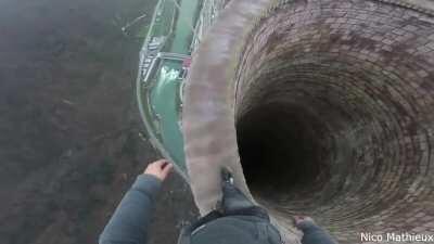 Walk on the edge of the largest chimney in Europe which is 360 meters high. (video by Nico Mathieux).