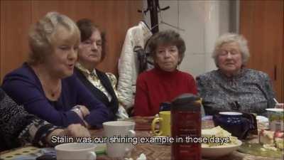 A group of elderly Soviet women talking about Stalin