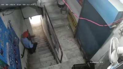 Sikh security guard shoots robber point blank with shotgun.