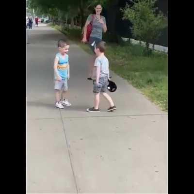 It's been months since this kid has seen his best friend, so their parents scheduled a surprise meetup for them.