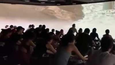 A neat fitness center with an incredible projection screen to keep cyclists more focused