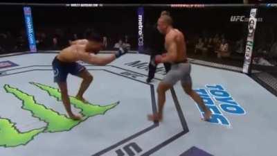 Kevin Lee's famous chicken dance after being caught by an Edson Barboza wheel kick