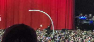 Building a giant platic cup tower waiting for the show