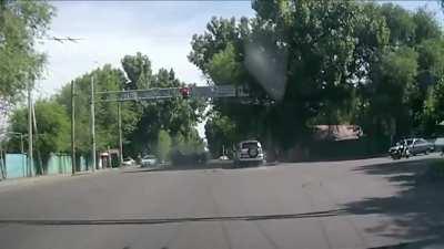 A very violent collision between two cars.