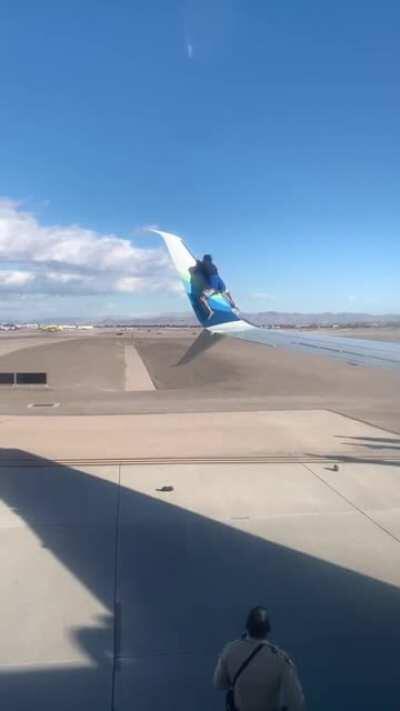 Theres a man.. On the wing..