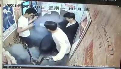 Bringing a electric scooter inside of an elevator.