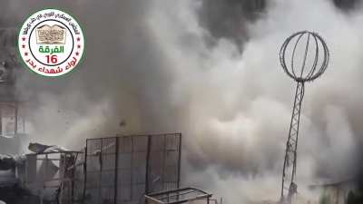 FSA 16th Division blasts apart a sandbagged SAA fighting position/barricade with repeated improvised cannon strikes - Aleppo - 9/25/2014