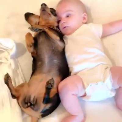 Snuggling up to be with my new tiny human