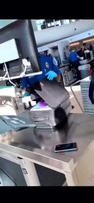 Sex toy in the luggage (his face tho)