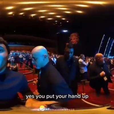 Adele stops in the middle of a performance to defend a fan