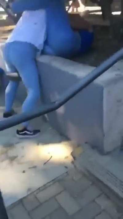 This fight happened at my school... Notice the girl in the blue pees her pants -.-