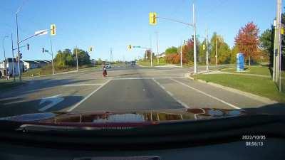 Idiot almost runs over three people crossing