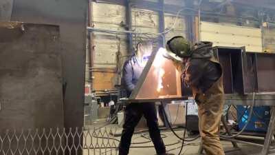 Double teaming some structural beams