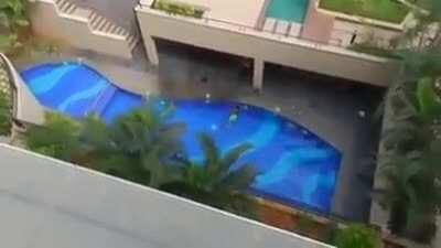 5th floor jump into swimming pool