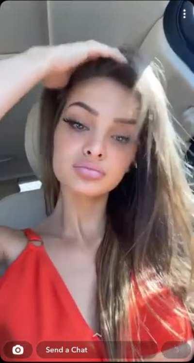 She goin for that under boob title