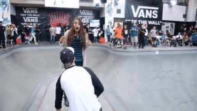 Skateboarder proposes to his girlfriend.
