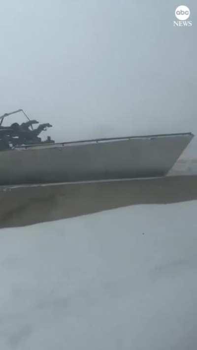 the scene of a deadly pileup on the Ohio Turnpike that involved approximately 50 vehicles during snowy conditions. One person died and multiple people were injured, Ohio Highway Patrol said.