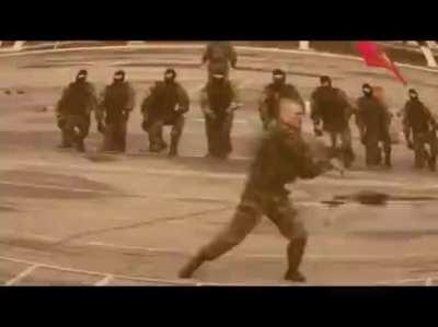 Luka’s army demo some nun chuck techniques.