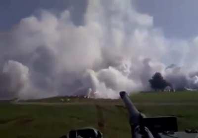 Tank deploying a smoke screen