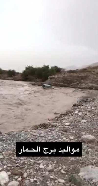 Trying to cross a raging river with a car is always a good idea!