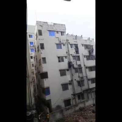 Bangladeshi students seen falling from building's as anti quota protests turn violent.