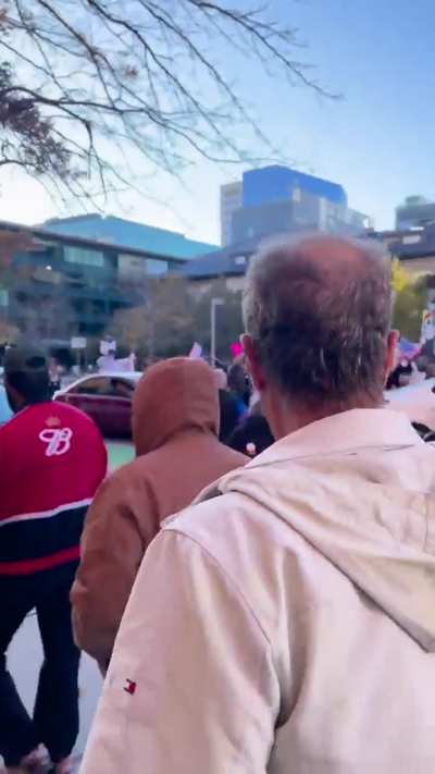 Trump boomer in Denver shouts slurs at protest then faceplants twice