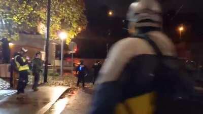 Antifa militant who ignored multiple, loud warnings to stop trespassing on government property is tackled directly into a large puddle