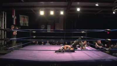 Angel Rose getting one hell of a low blow kick from Samantha Heights