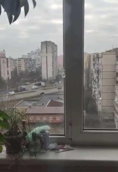 Russian vehicle rides over a car with a civilian in it.