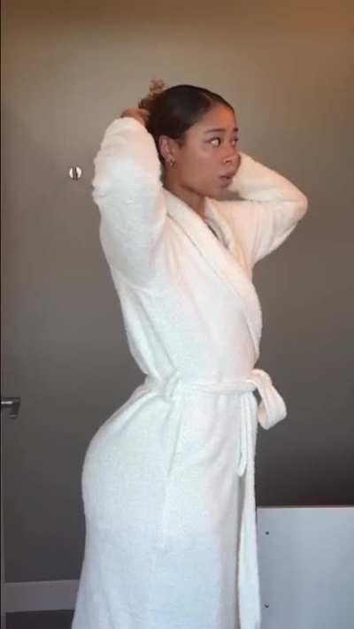 Booty too big to be completely hidden under that robe