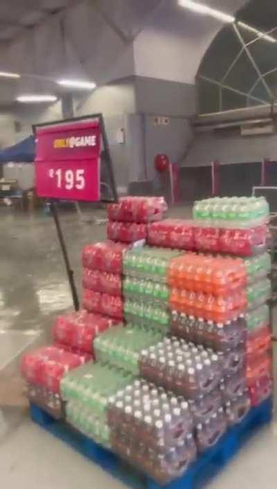 Supermarket door can't hold rain and wind from thunderstorm in Empangeni, South Africa. April 3 2023
