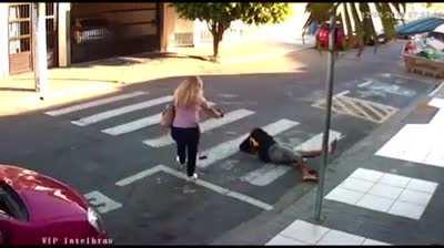 By robbing a group of people.