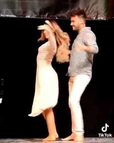 No underwear in a dancing competition ... With a slit dress.