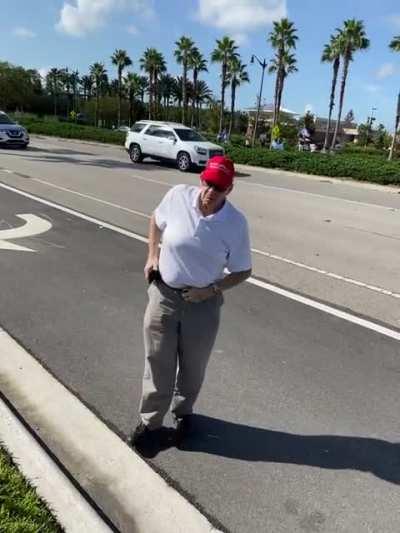 Trumper gets knocked out after threatening man in his golf cart