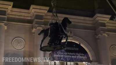 Statue of Teddy Roosevelt being removed from the Natural History Museum in New York. Leftwing activists said the statue was racist.
